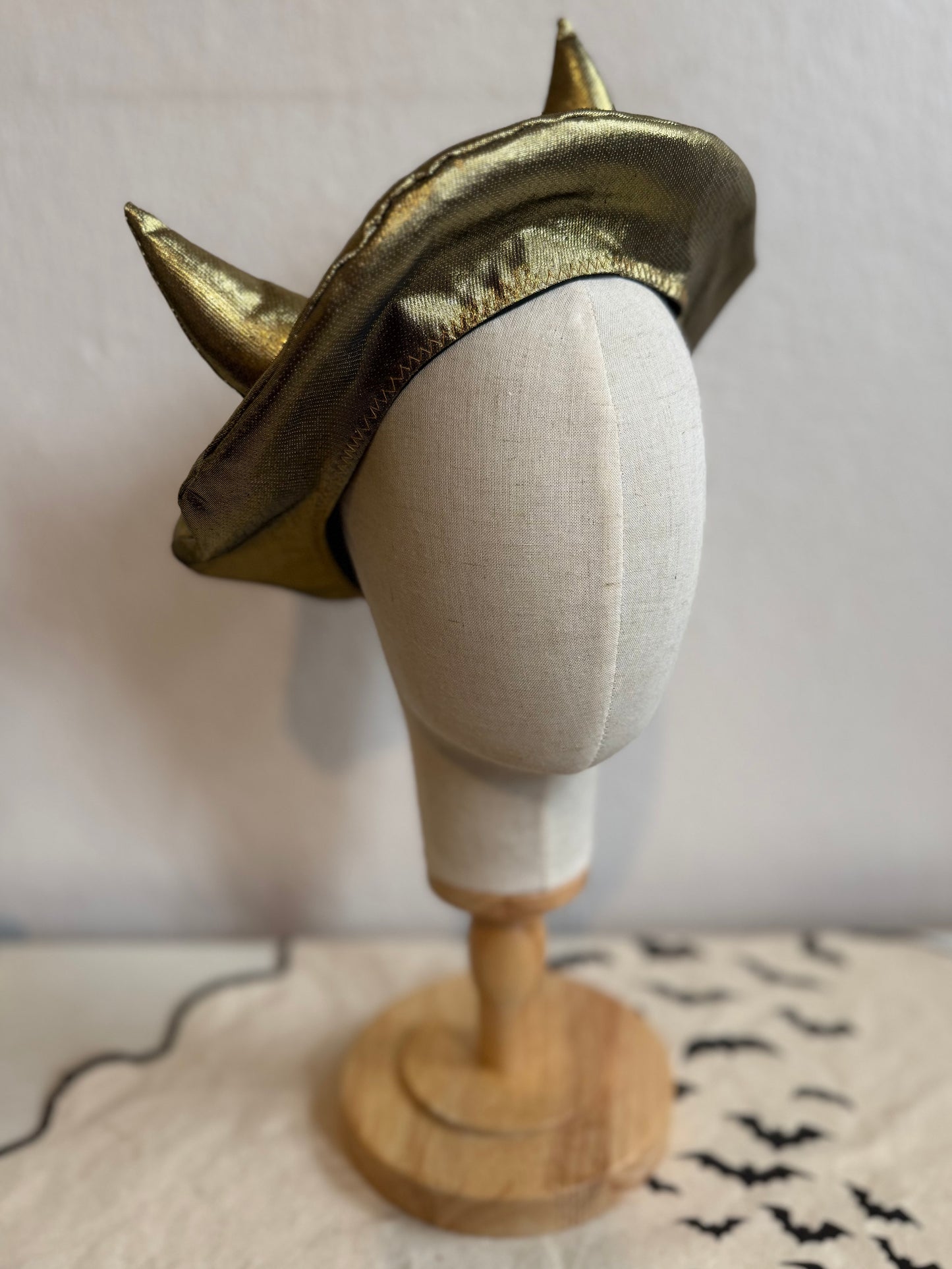 gold devil beret