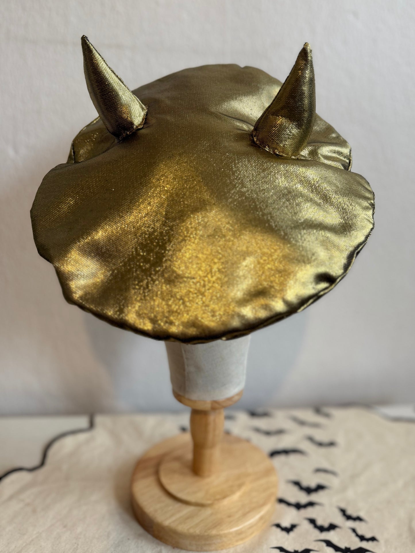 gold devil beret