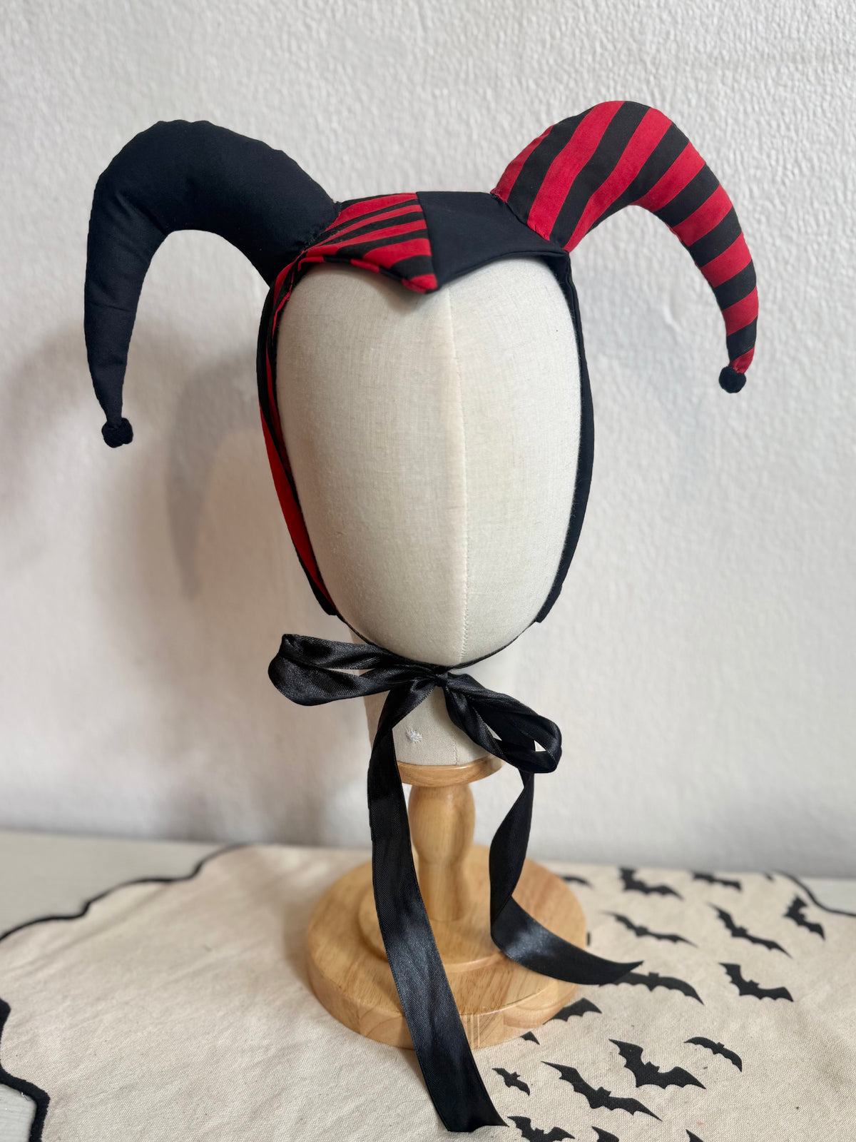 red and black halloween horror jester hat 